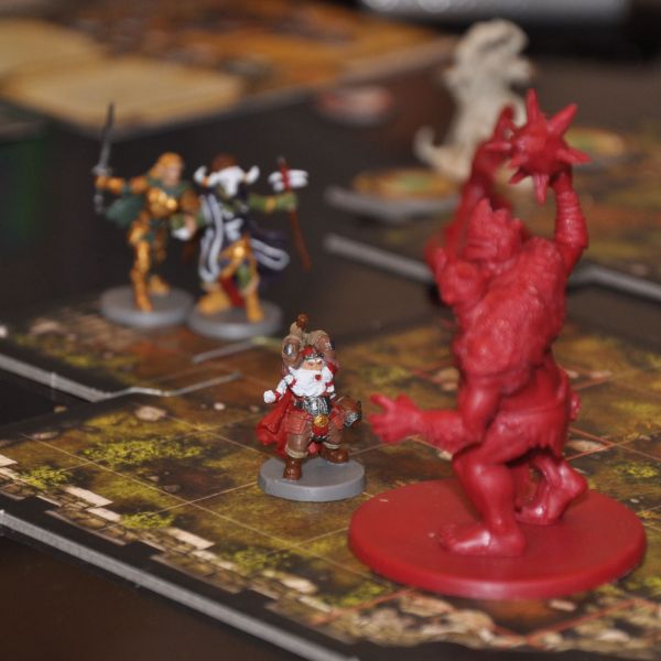 Unmatched utilizes cards and miniatures for Dallas tabletop gaming.
