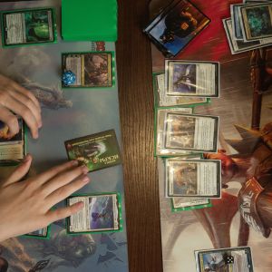 Dallas MTG players playing a round of the Modern MTG format.